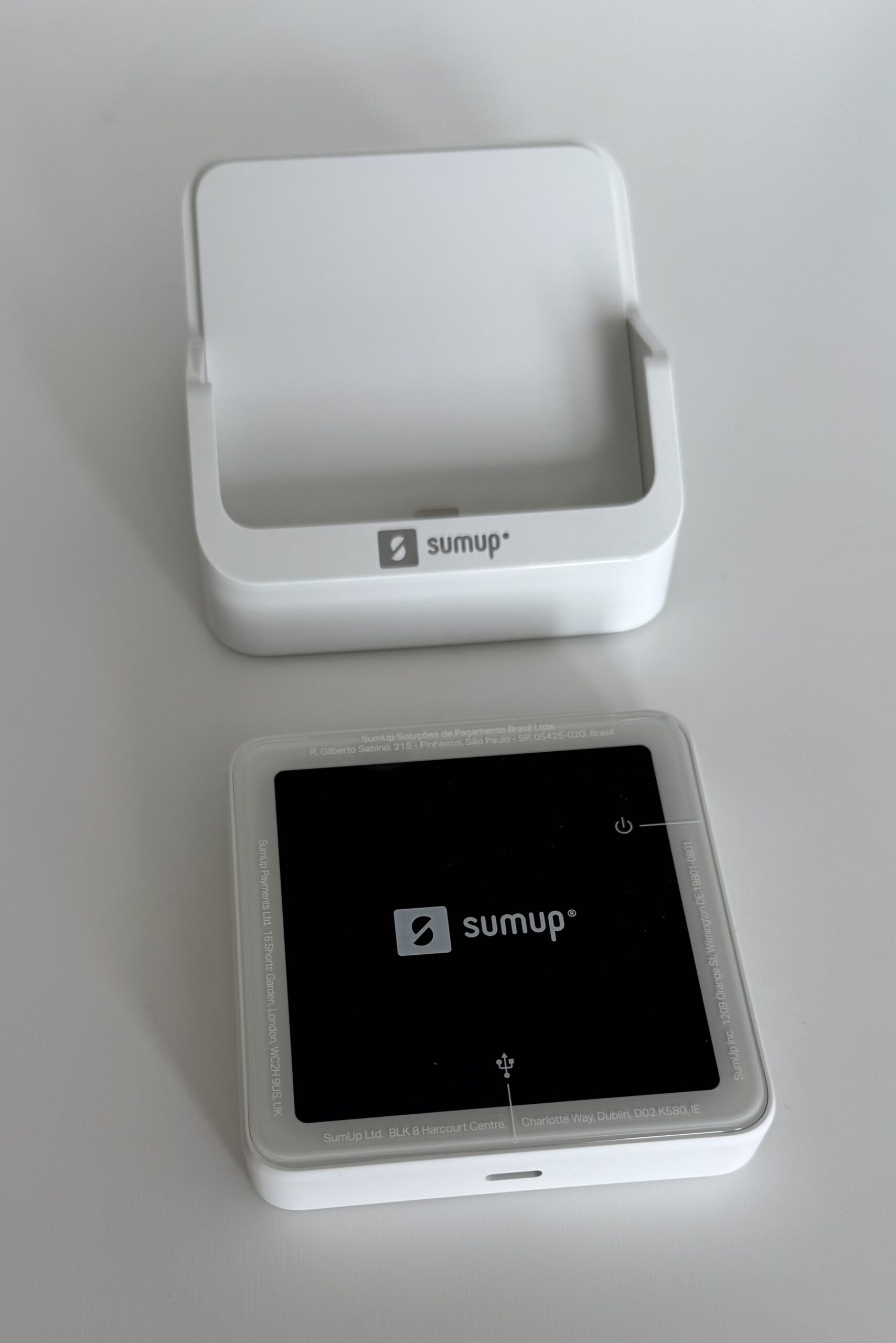 SumUp Solo card reader lifted out of its charging station
